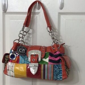 Lookalike Coach designed bag w/ registered CM trademark. Colorful.